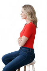 Razzmatazz Red Crewneck Short Sleeve Top Seated Side View - Flattering Fit Wrinkle-Free Travel Clothing | JudyP Apparel