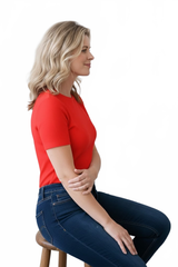 Razzmatazz Red Crewneck Short Sleeve Top Seated Side Profile - Flattering Fit Wrinkle-Free Travel Clothing | JudyP Apparel